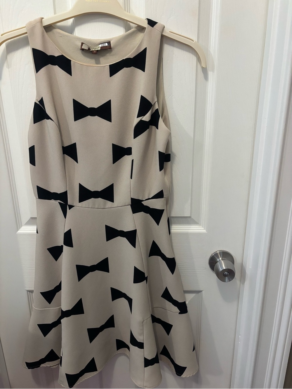 Eva Franco Cream Dress with Black Bow Print